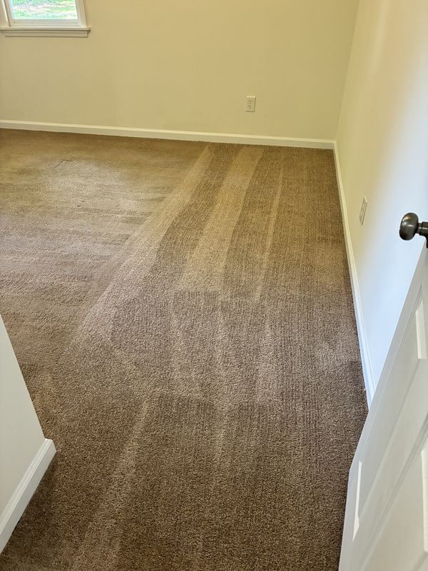 Bedroom carpet with fresh vacuum lines