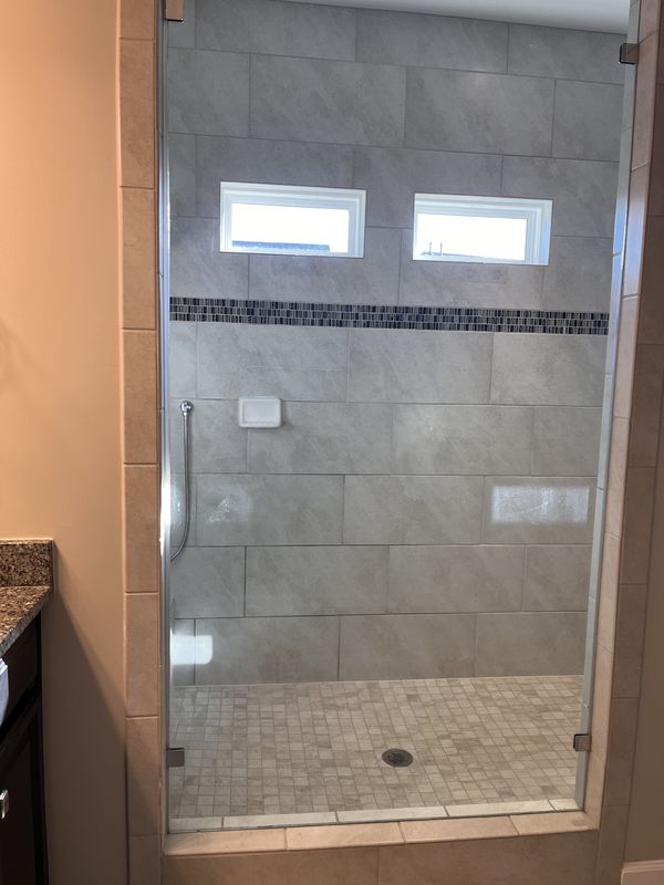 Spotless tiled walk-in shower